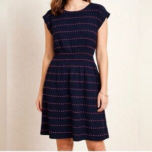 Navy blue textured dot sleeveless smocked waist dress